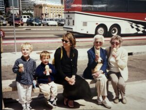 Photo of the boys, my grandmother and my mother-in-law enjoying ice cream cones on a bench in San Diego. My mom is the photographer. My body language indicates that I am with the boys, maybe not with the other women.