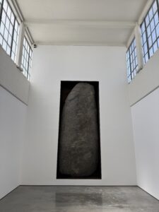 Michael Heizer's piece at Dia Beacon. An enormous  boulder in a recessed box in a wall.