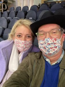 Phil and I with face masks on at the Rose Bowl Game in Texas